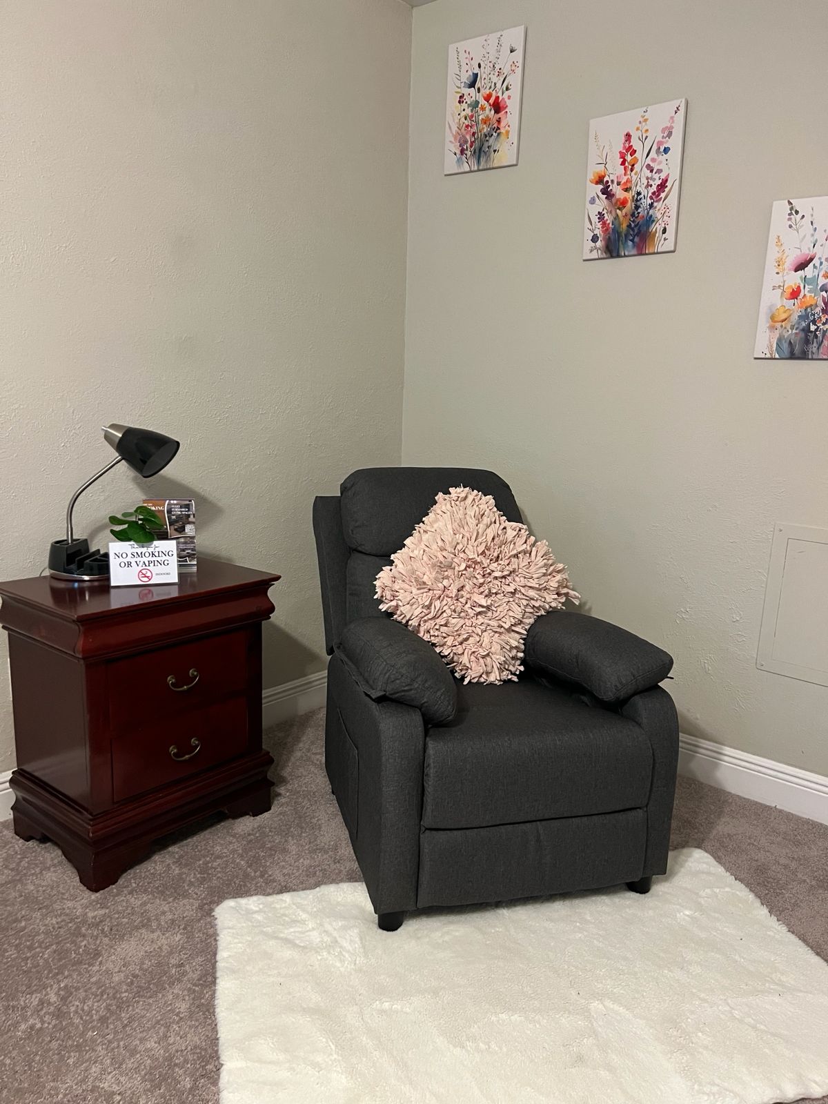 Quiet reading corner with recliner and nightstand